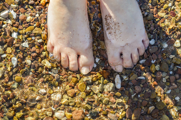 Wading toes in the ocean water Digital Download