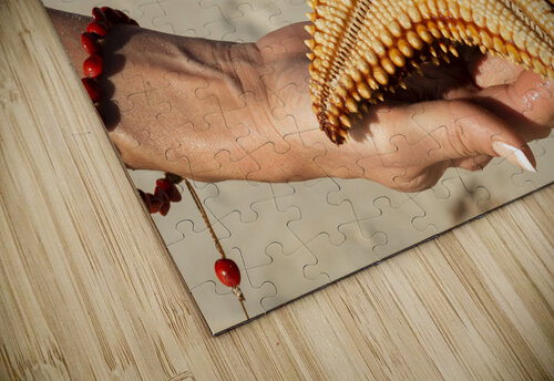 Starfish in womans hands Justin Richard Batten puzzle