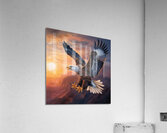 An eagle appears soaring against the backdrop of a stunning sunrise with its majestic wings Acrylic Print