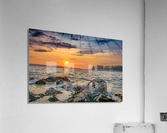 Sunset over rocky beach Acrylic Print
