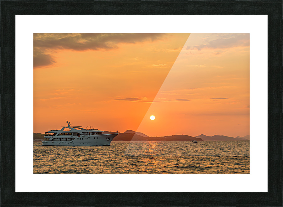 Ship sailing at sunset Picture Frame print