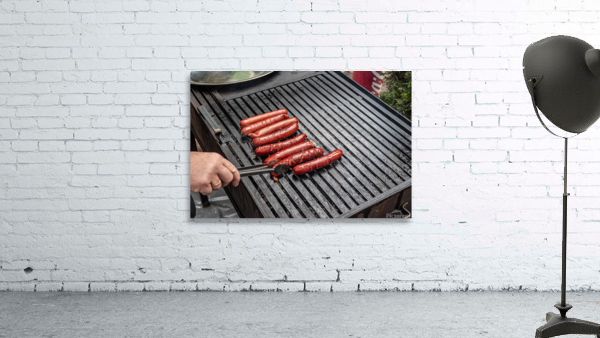 Frying sausages Wall Preview