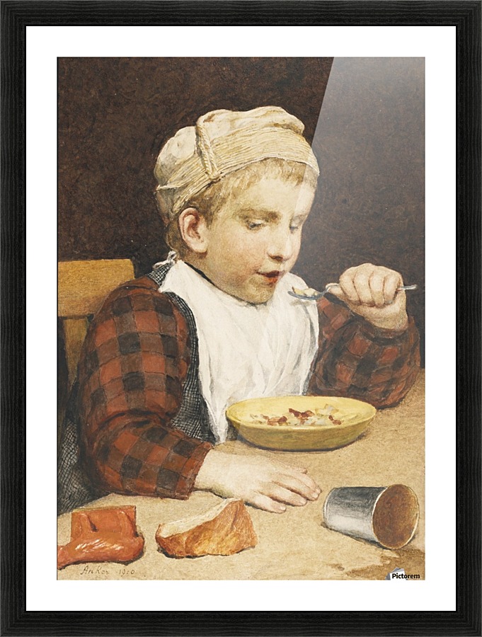 A young boy eating Picture Frame print