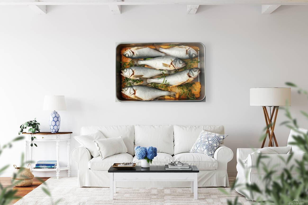 A rectangular baking tray filled with fresh fish Reproduction