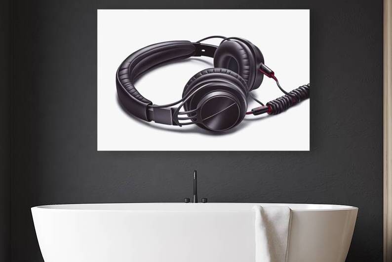 A pair of headphones predominantly black in color by Romeu Hurmuzache