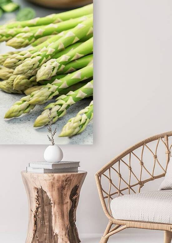 A close up view of fresh asparagus spears with th by Romeu Hurmuzache