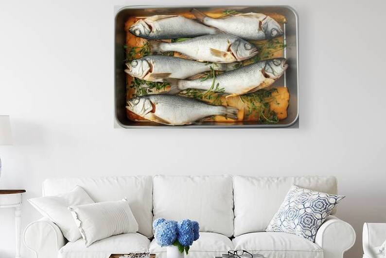 A rectangular baking tray filled with fresh fish by Romeu Hurmuzache