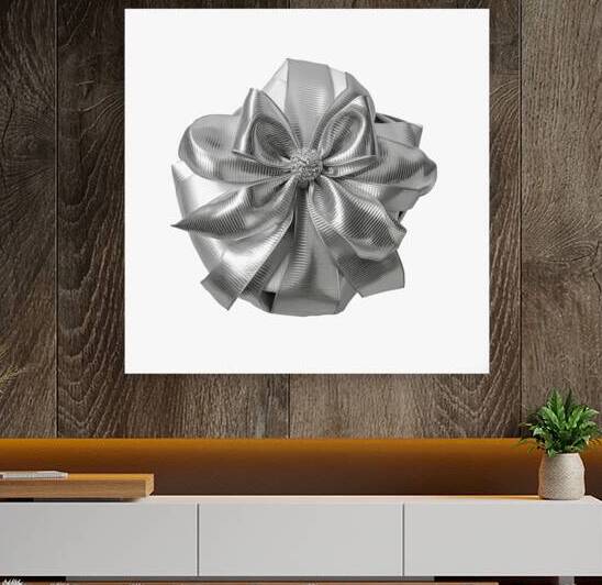 Silver glossy ribbon bow gift isolated on white b by Romeu Hurmuzache