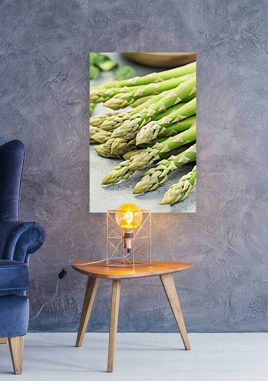 A close up view of fresh asparagus spears with th by Romeu Hurmuzache
