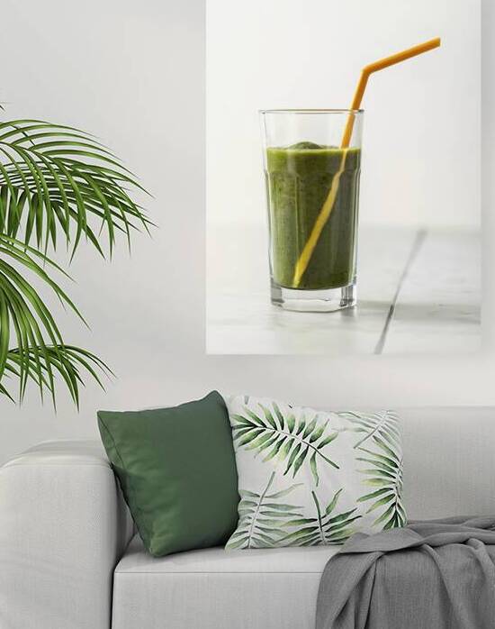 A clear glass filled with a green smoothie 3 by Romeu Hurmuzache