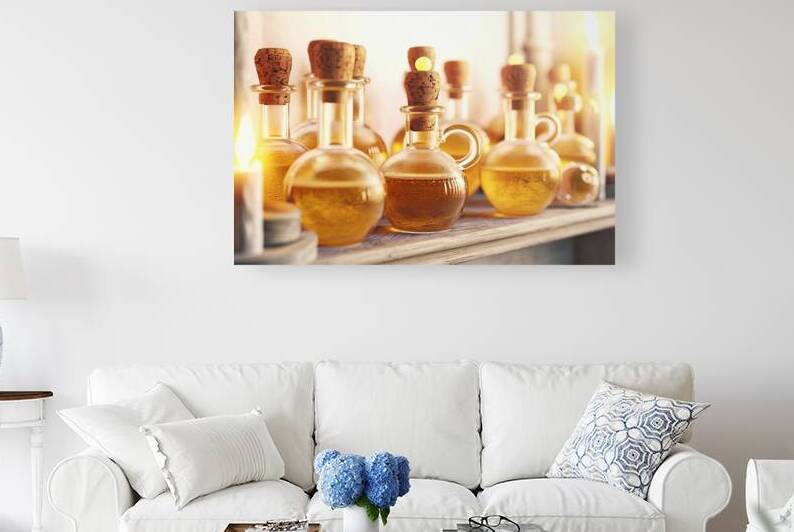 Several glass bottles with cork stoppers filled w by Romeu Hurmuzache