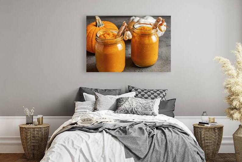 Two glass jars filled with a homemade pumpkin pas by Romeu Hurmuzache