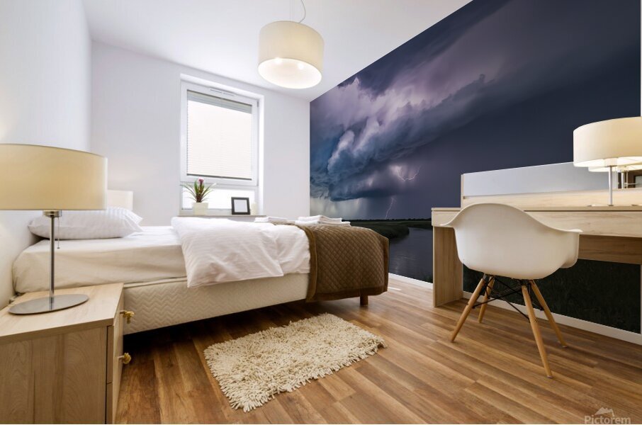 A dramatic scene featuring immense storm clouds l Mural print