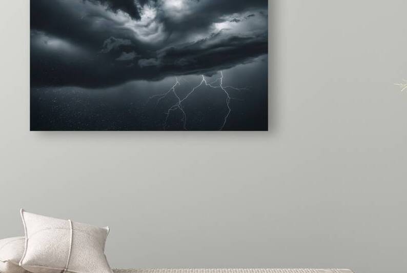a stormy sky with dark ominous clouds rapidly con by Stoica Lilian