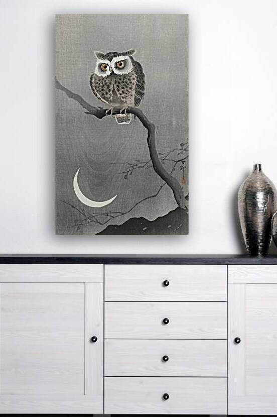 Long-eared owl on bare tree branch 1900 - 1930 by Ohara Koson 1877-1945. by IStockHistory com