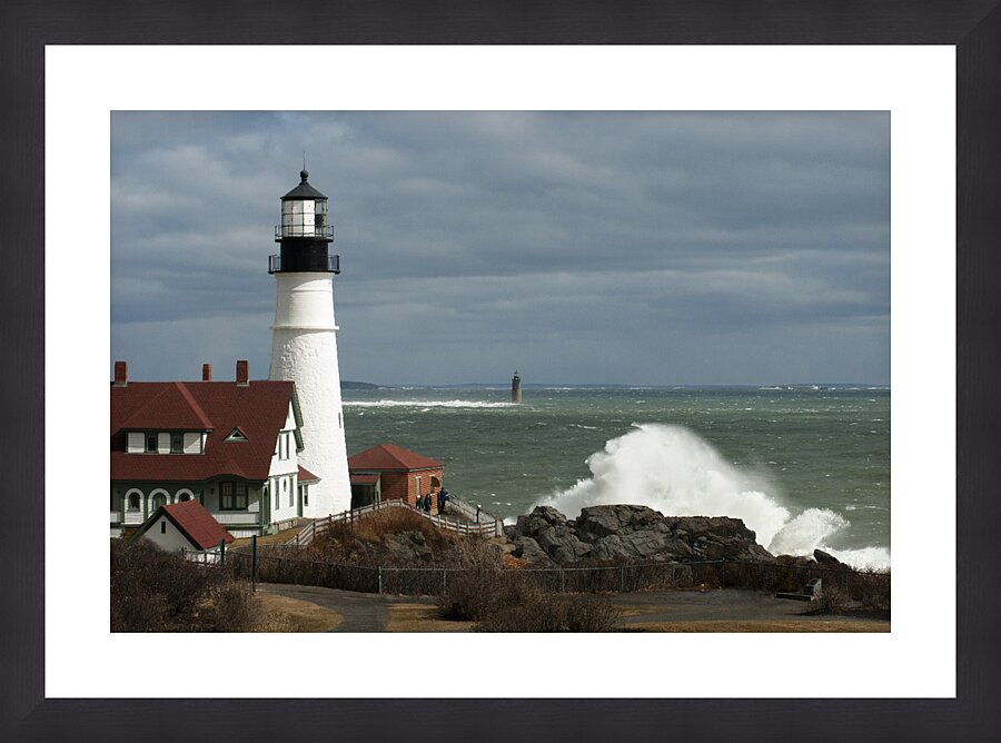 Waves Crash By Portland Head Lighthouse as Sun Breaks Through Clouds Picture Frame print