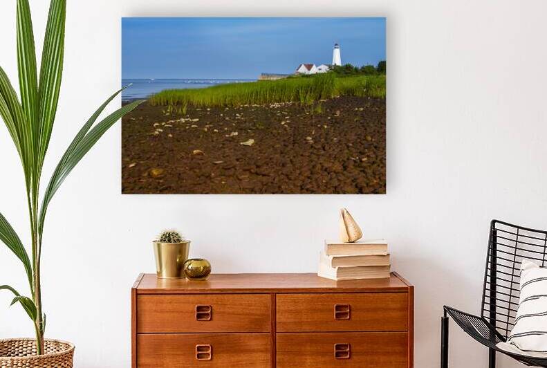 Low Tide at Rocky Shore by Lynde Point Lighthouse in Connecticut by Allan Wood