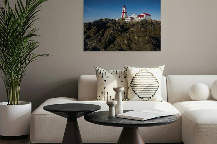 Low Tide Displays Rocky Shore at Head Harbor Lighthouse on Campobello Island in Canada by Allan Wood