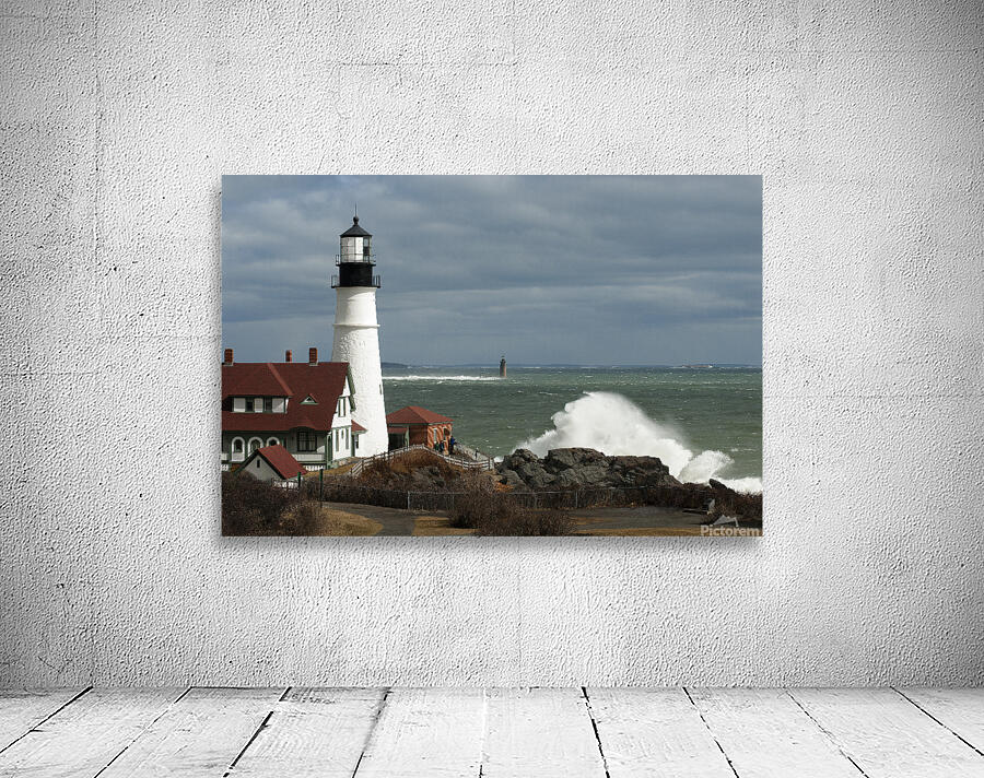 Waves Crash By Portland Head Lighthouse as Sun Breaks Through Clouds Wall Preview