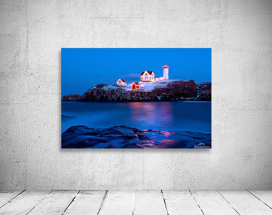 Lighted Cape Neddick Nubble Lighthouse During the Holidays in Maine Wall Preview