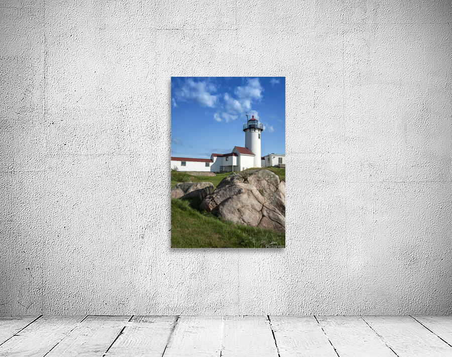 Boulder Shaped Like Wave in Front of Eastern Point Lighthouse in Massachusetts Wall Preview