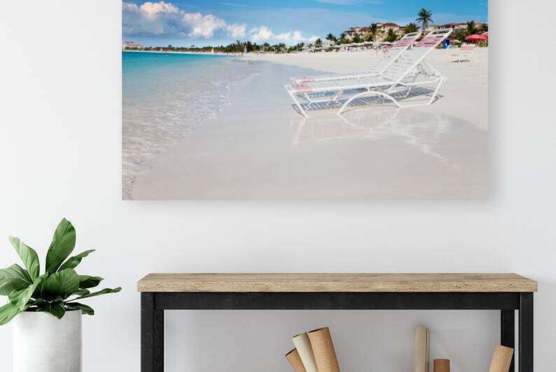 Lounge chairs on tranquil Grace Bay Beach by Jo Ann Snover