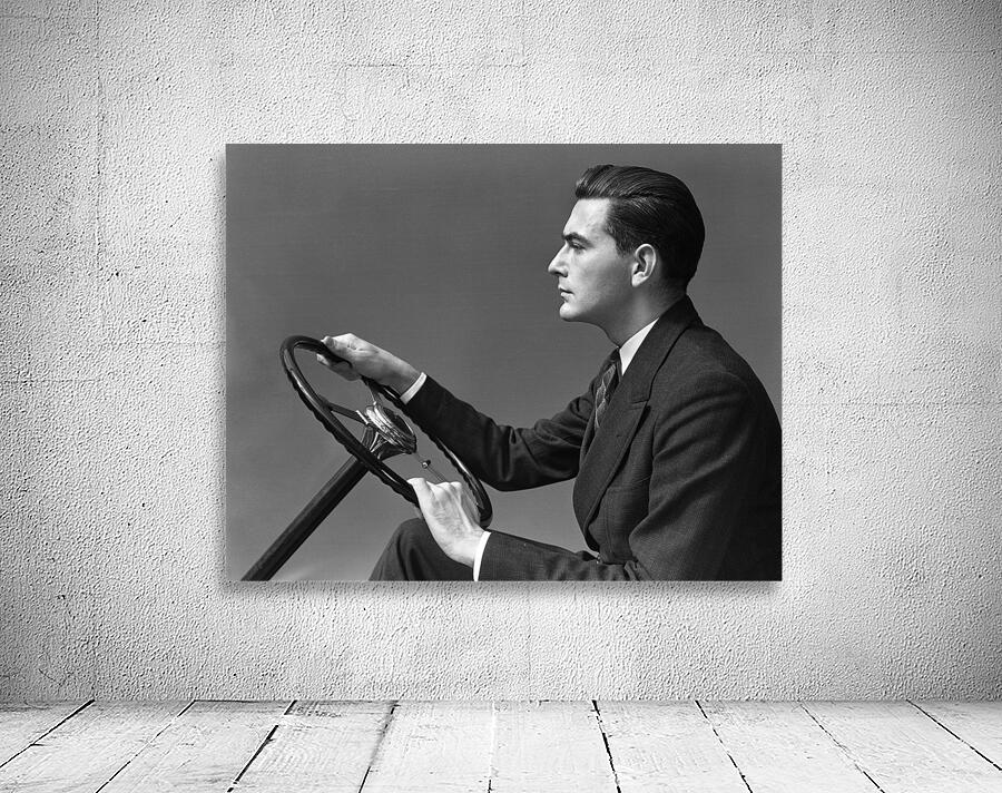 1930s-40s MAN WEARING SUIT AND TIE DRIVING 194394 Wall Preview