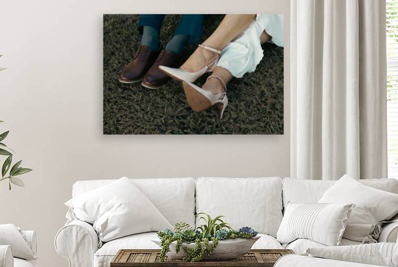 Bride and Groom Wedding Shoes Resting on the Grass by Bruno Dias
