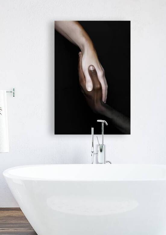 Black and white hands entwined by iRT