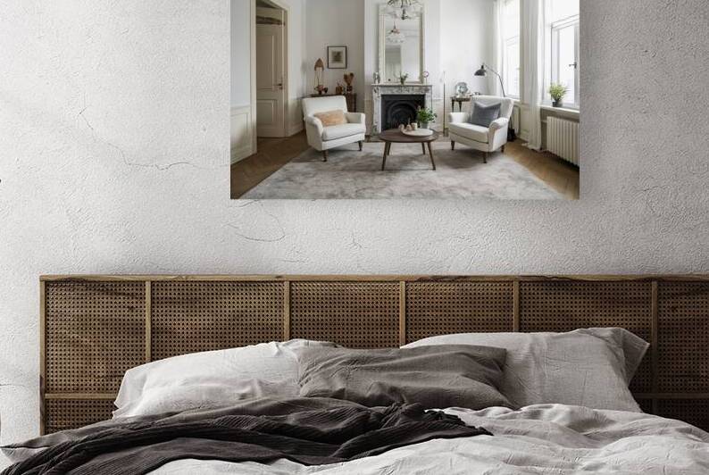 Minimalist living room with white vintage armchai by Marius Tomus