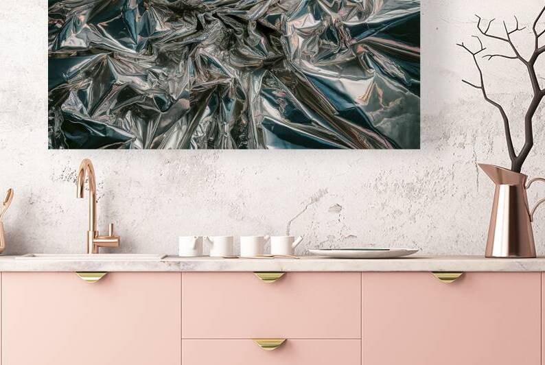 A striking photograph of a crumpled metallic surf by Mitica Mihaila