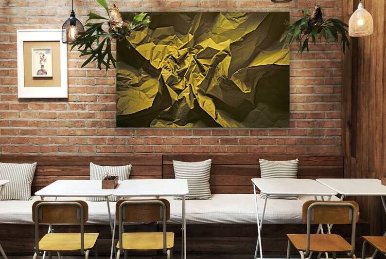 a heavily crumpled yellow sheet of paper 1 by Mitica Mihaila