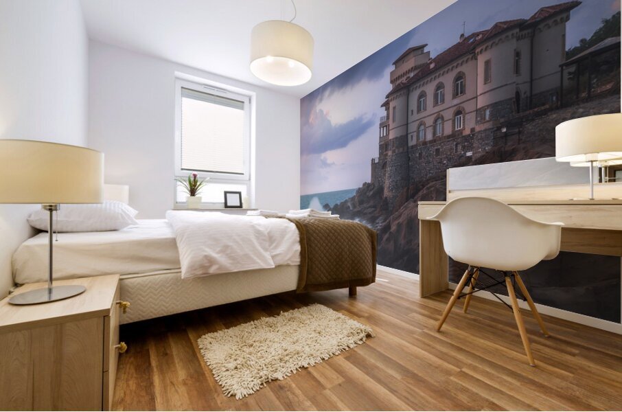 Boccale castle on the rocks and rough sea. Italy Mural print