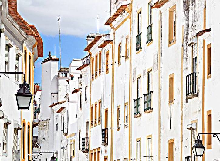 White facades in a street of Evora. Portugal by Stefano Orazzini