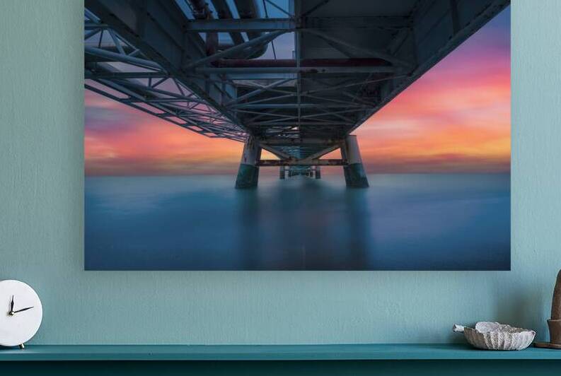 Industrial pier on the sea at sunset by Stefano Orazzini