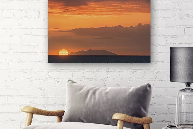 Gorgona island and setting sun view from Livorno coast. Tuscany by Stefano Orazzini