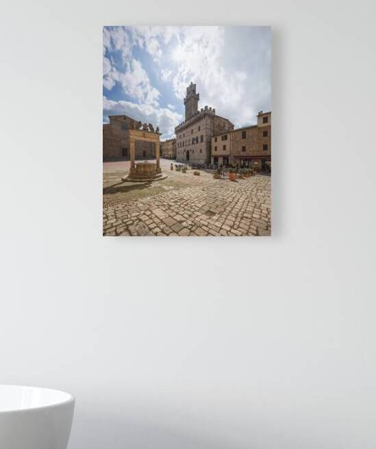 Piazza Grande  and the well in Montepulciano.  by Stefano Orazzini