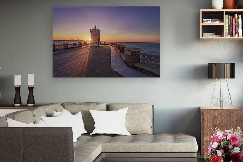 Sunset view of Piombino piazza Bovio lighthouse and Elba Island by Stefano Orazzini