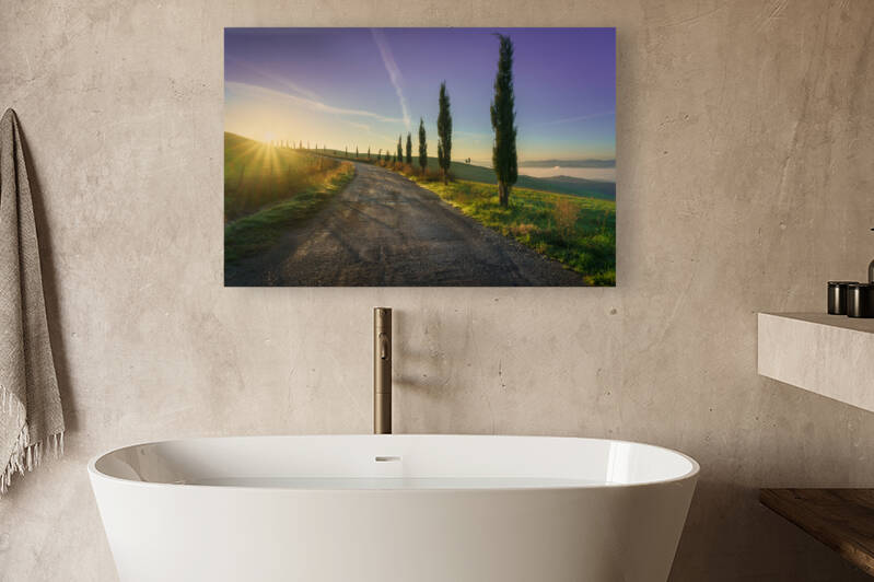 Volterra landscape tree lined road rolling hills and fog at sunrise. Tuscany Italy by Stefano Orazzini