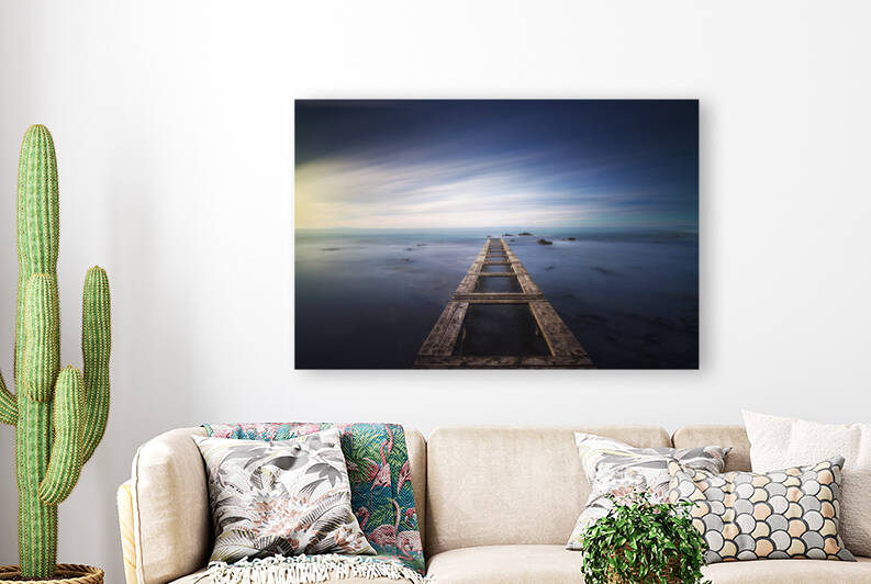 Wooden pier remains in a blue sea. Long Exposure. by Stefano Orazzini