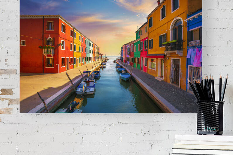 Burano island canal colorful houses and boats at sunset. Venice Italy by Stefano Orazzini