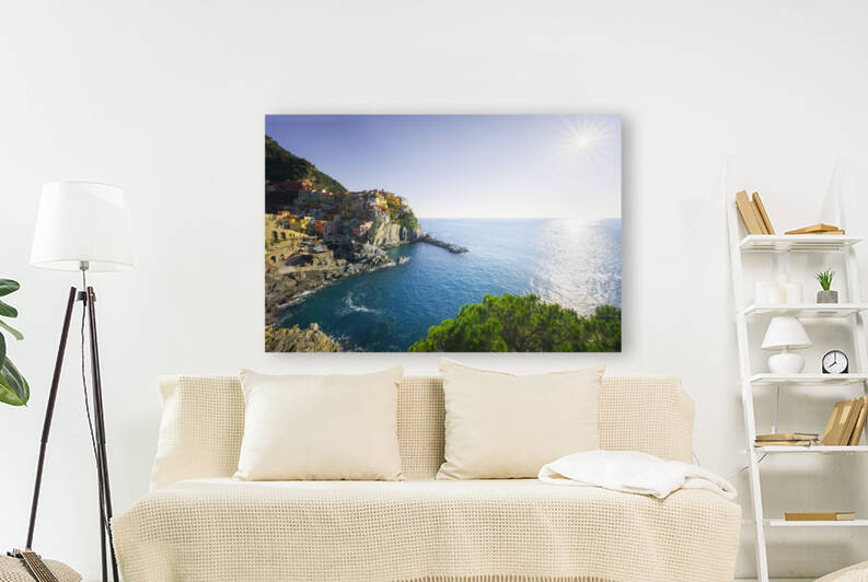 Manarola village on the rocks on a clear day. Cinque Terre by Stefano Orazzini