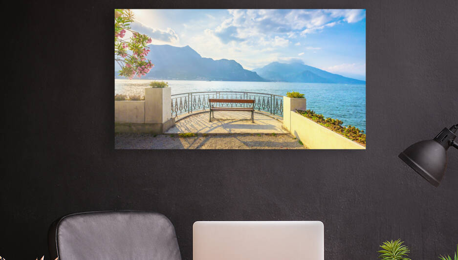 Bench on the lakefront in Lake Como. Bellagio Italy by Stefano Orazzini