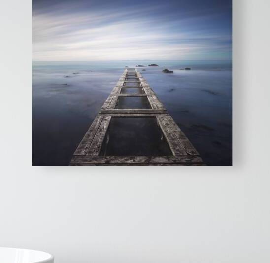 Wooden pier remains in a blue sea. Long Exposure. by Stefano Orazzini