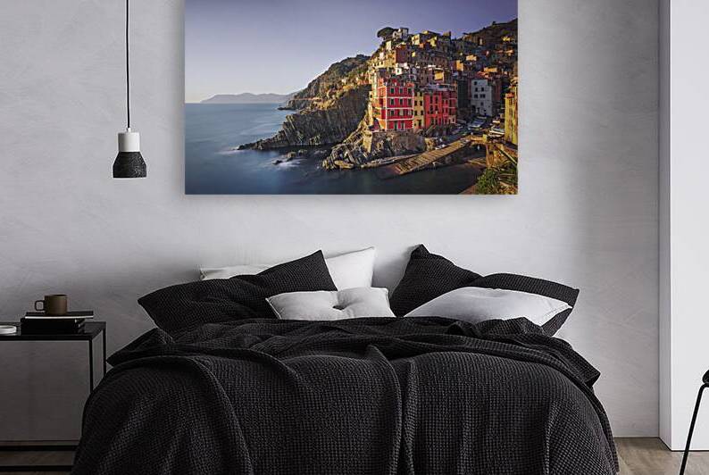 Riomaggiore town cape and sea at sunset. Cinque Terre Italy by Stefano Orazzini