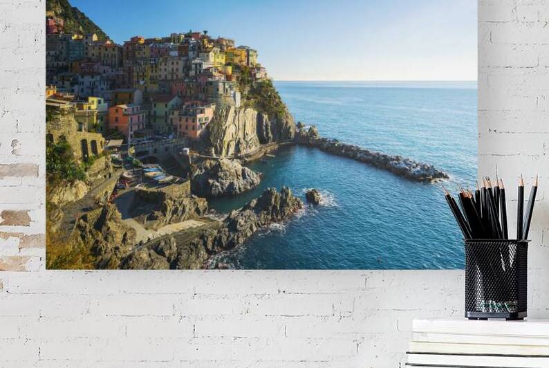 Manarola village on the rocks on a clear day. Cinque Terre by Stefano Orazzini