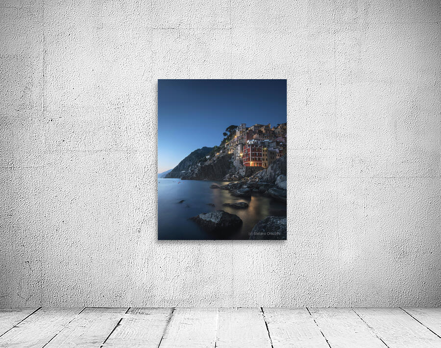Blue twilight over the fishing village of Riomaggiore Wall Preview