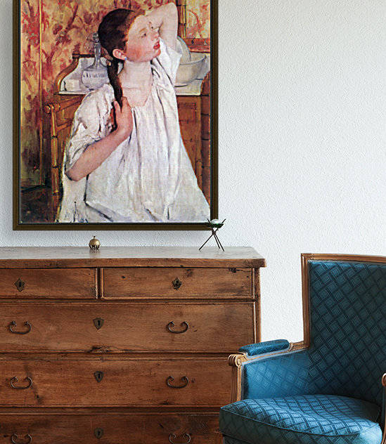 Girl arranging her hair by Cassatt