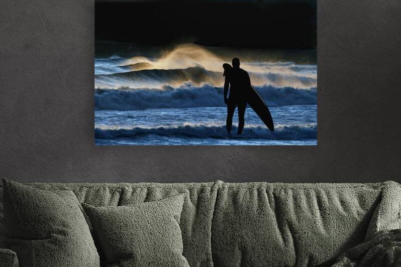 Surfer looking at the surf by Daniel L Friend