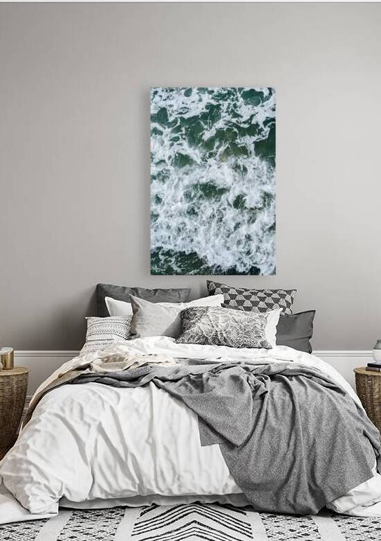 Abstract aerial view of swirling sea foam on deep green water by Cristina Taranovici